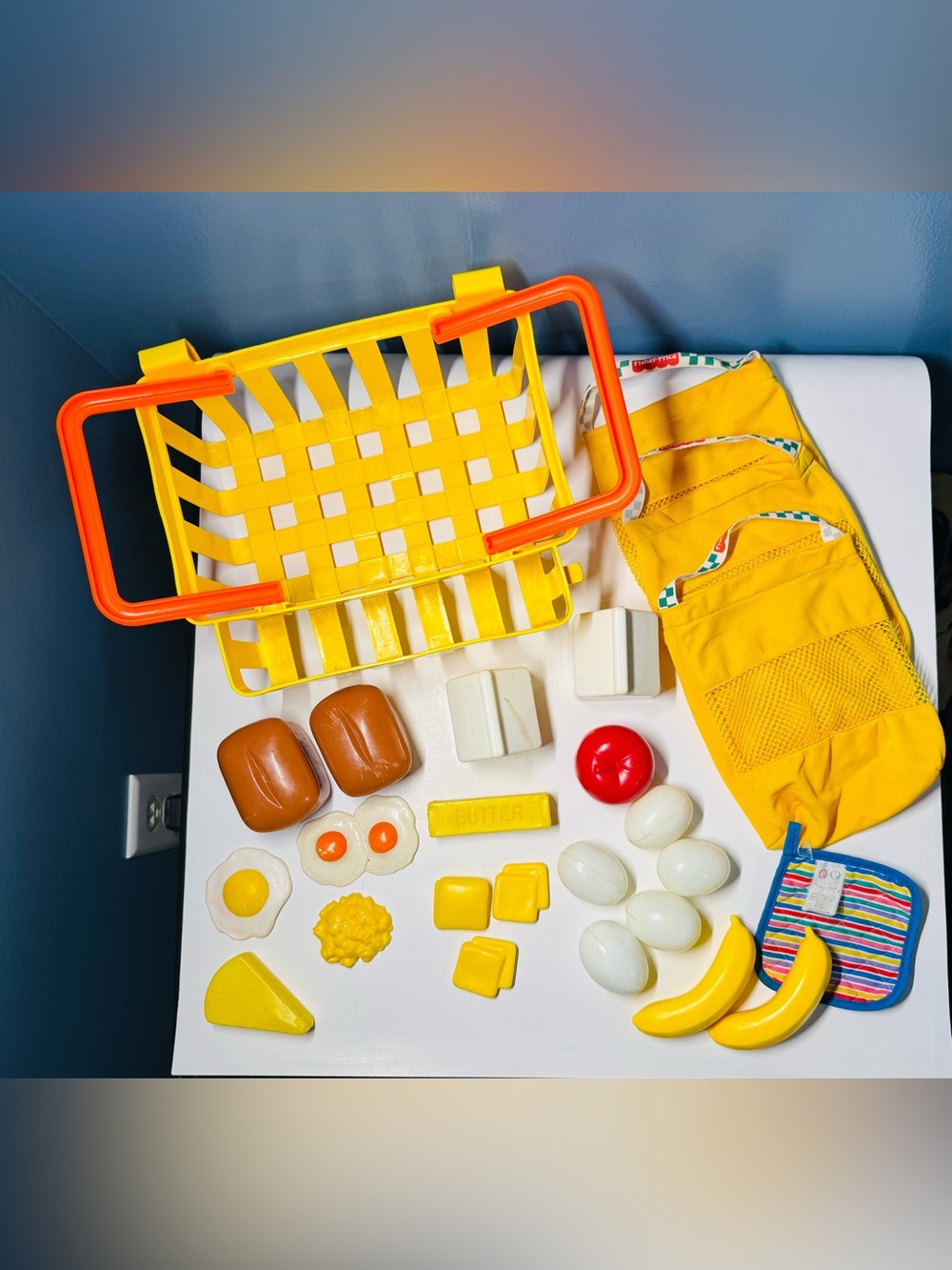 Fisher-Price Blue-Trim Striped Play Basket with Yellow Toy